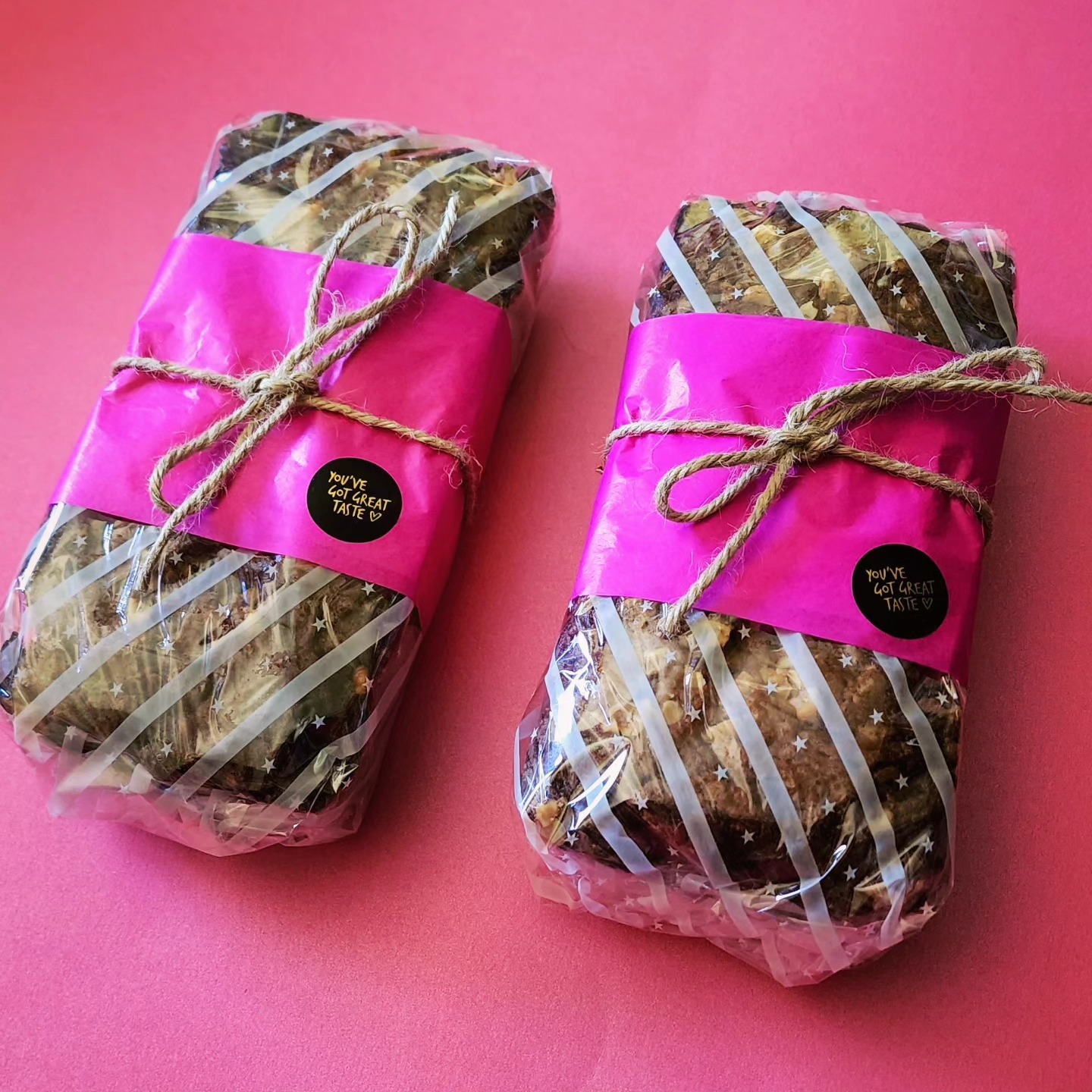 Wrapped loaves on hot pink