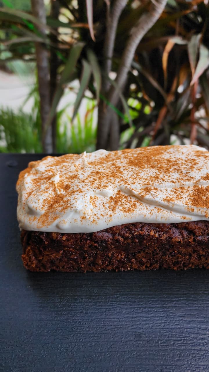 Loaf topped with cream fluff and cinnamon