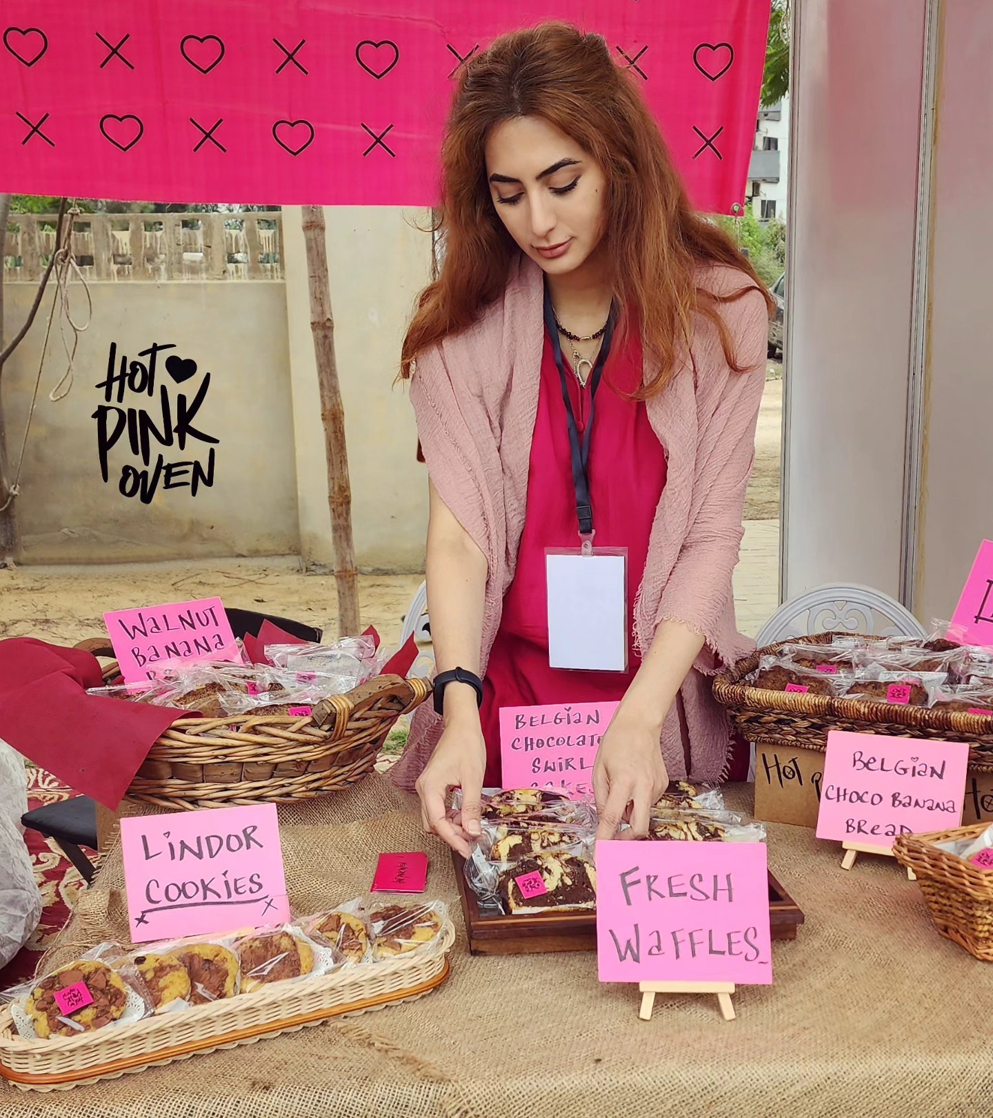 Setting out banana bread and Lindor cookies at a pop-up
